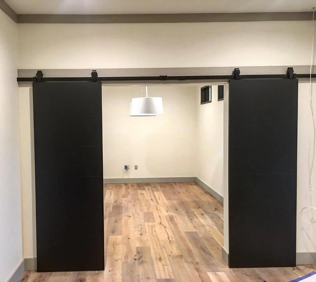 Remodeled interior with sliding barn doors